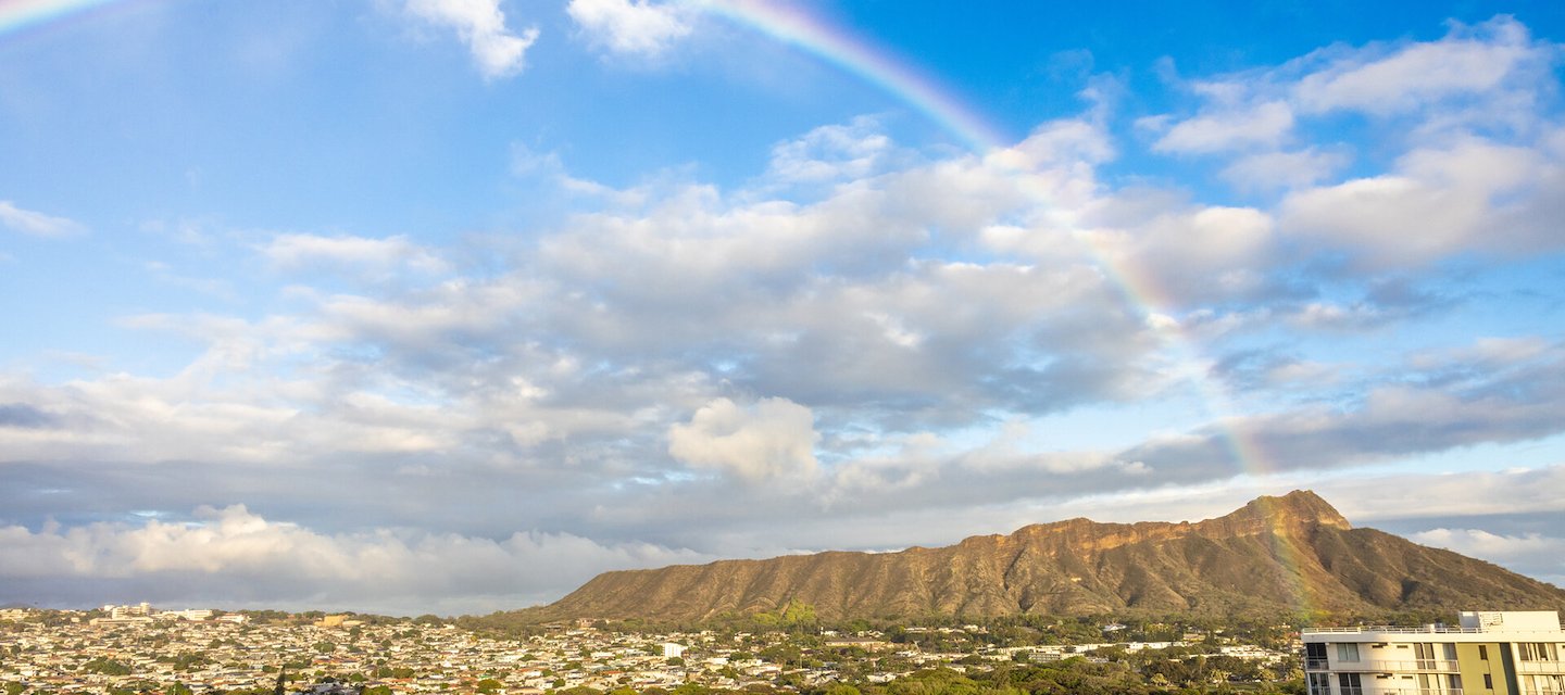 a rainbow over a city