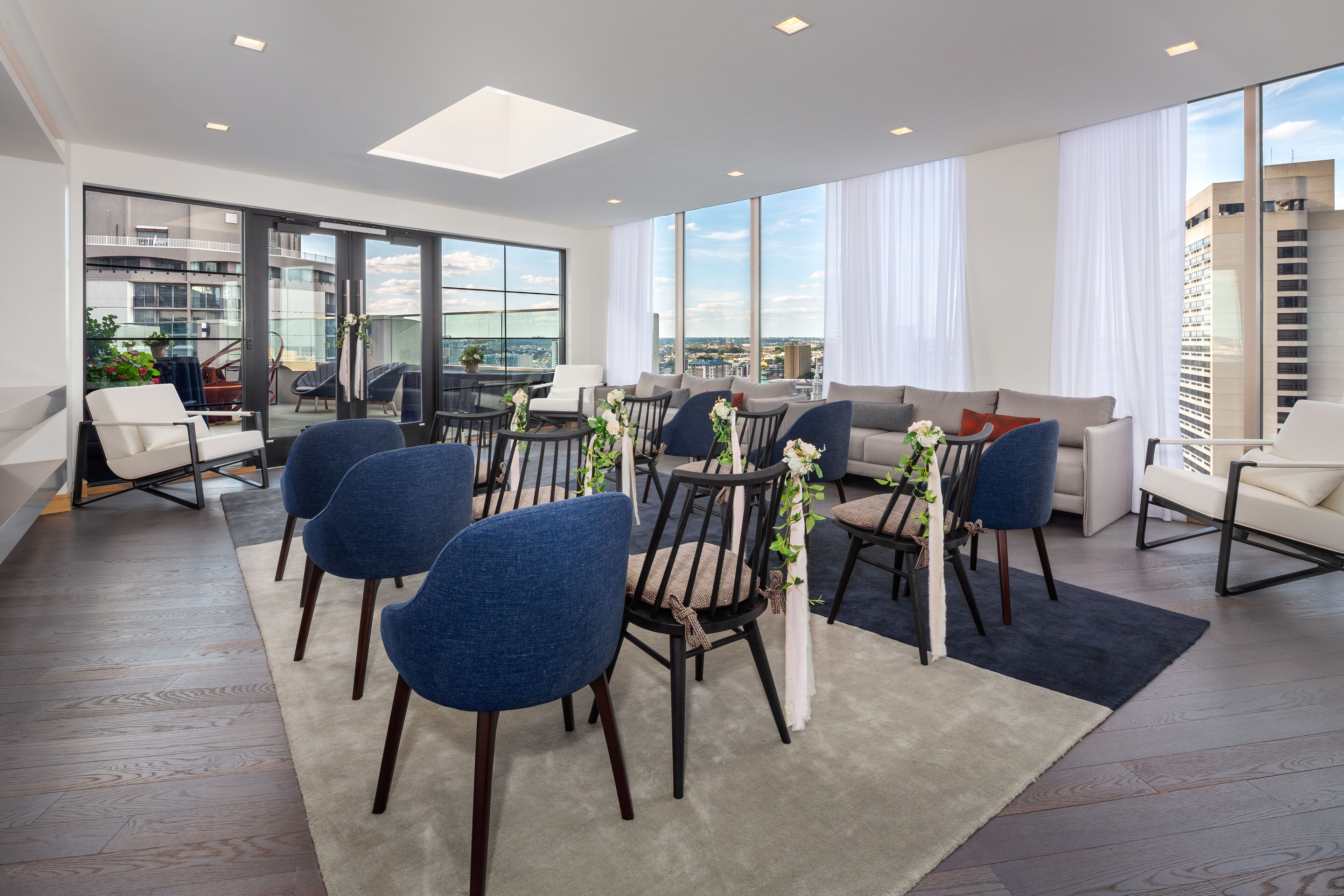 The Windsor Suites features a stylish event space with modern seating.