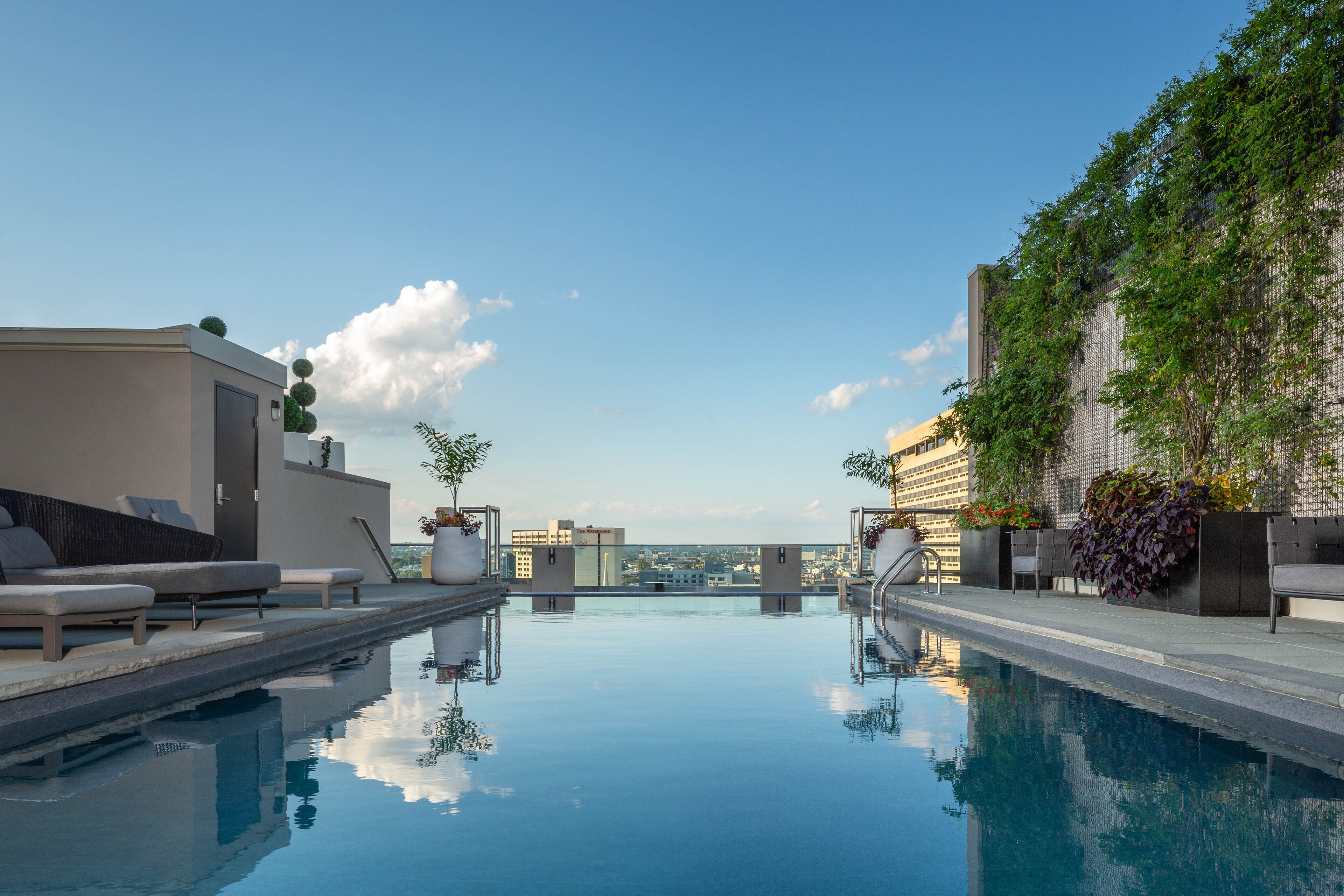 The rooftop pool at The Windsor Suites offers stunning city views.