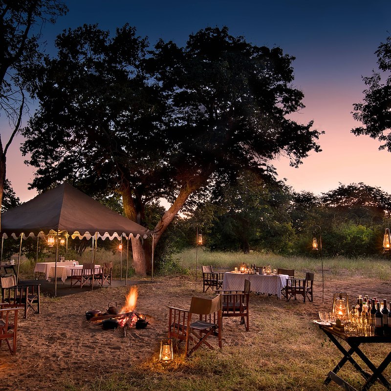 Meals are shared under canvas or out in the open