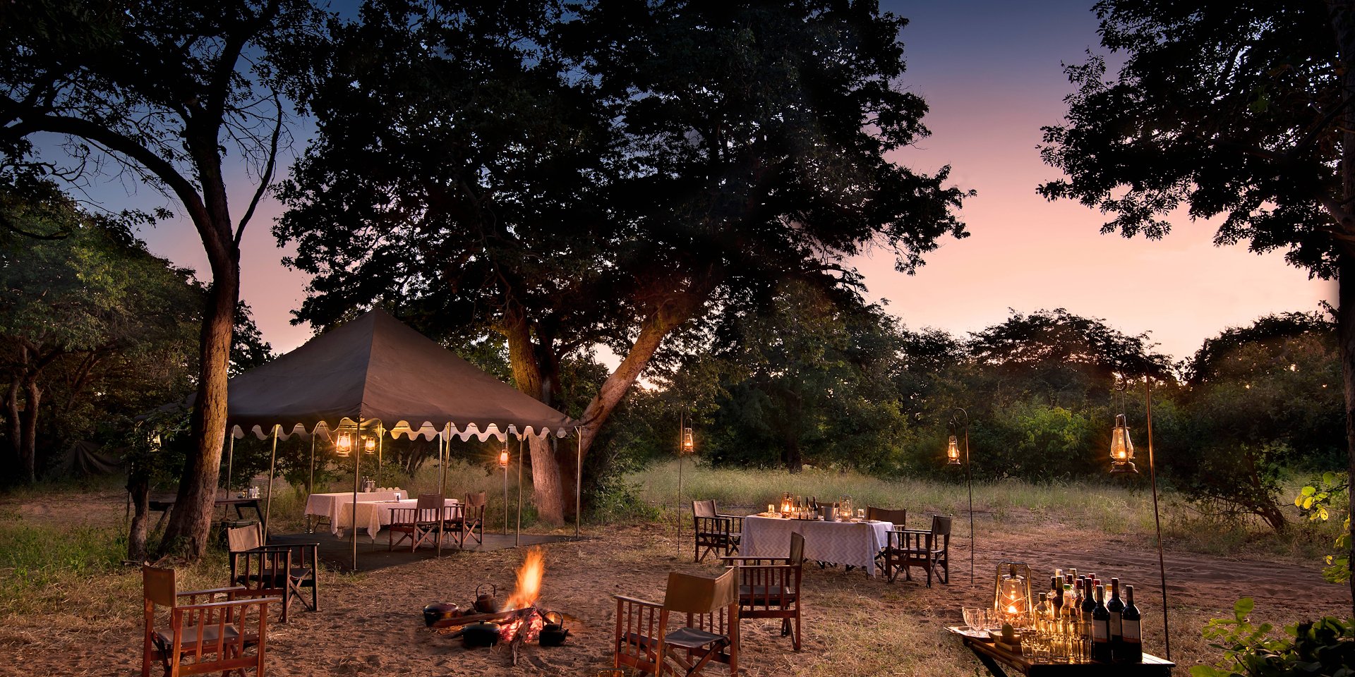 Meals are shared under canvas or out in the open