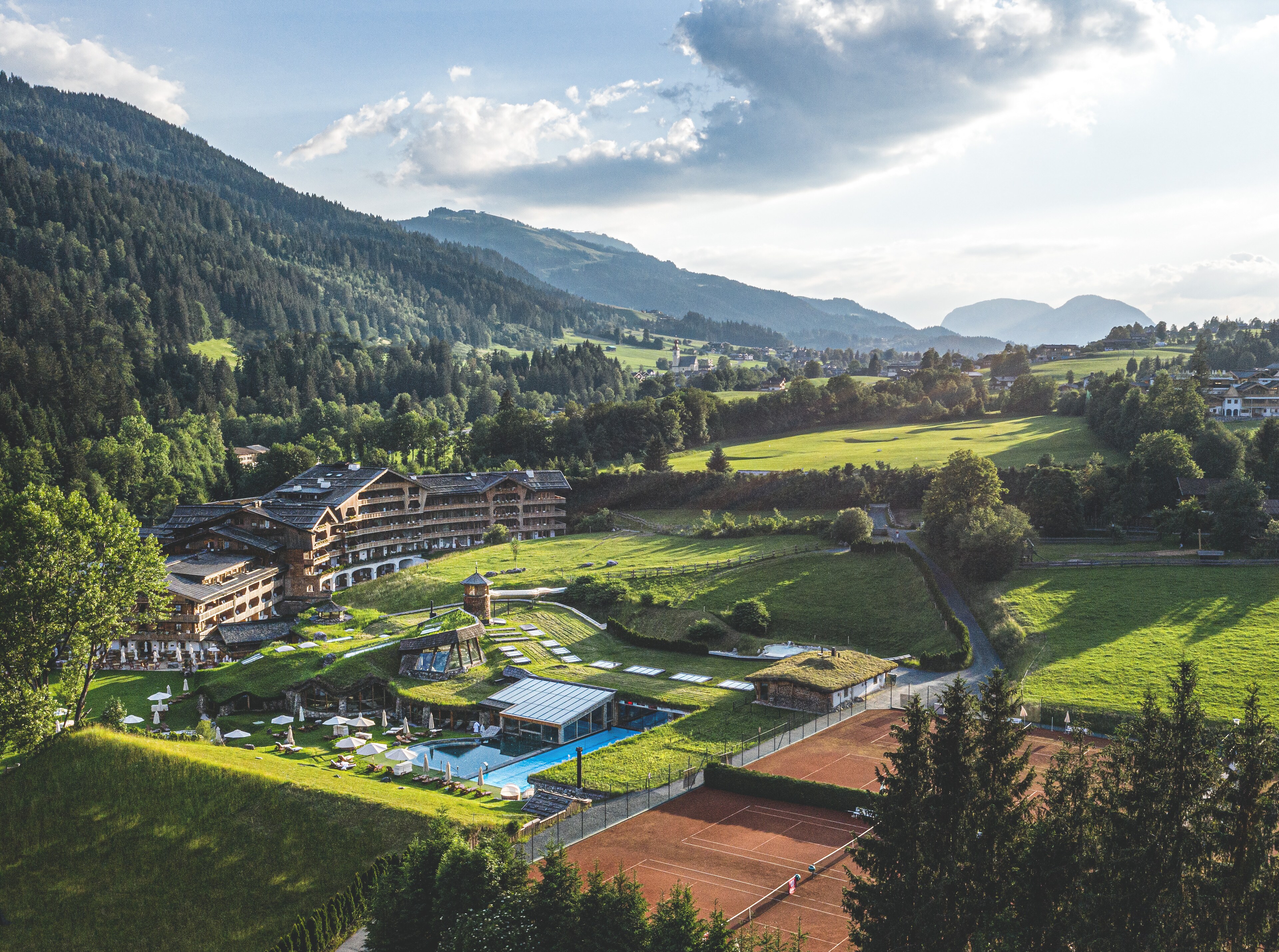 An Abundance of Outdoor Amenities Include a Swimming Pool and Five Clay Tennis Courts