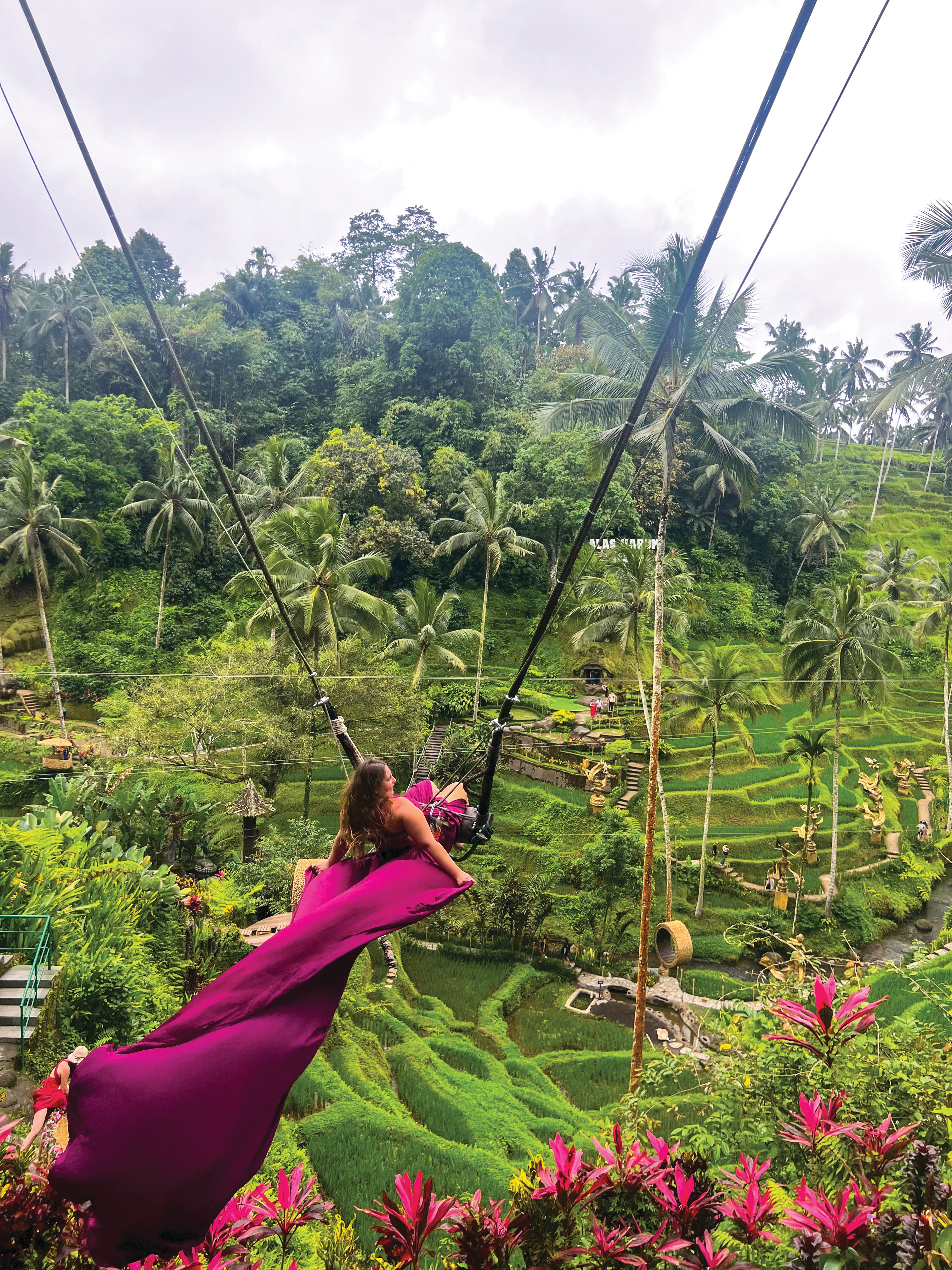 <p>Ashley on a swing overlooking rice paddies in Bali, Indonesia.</p>