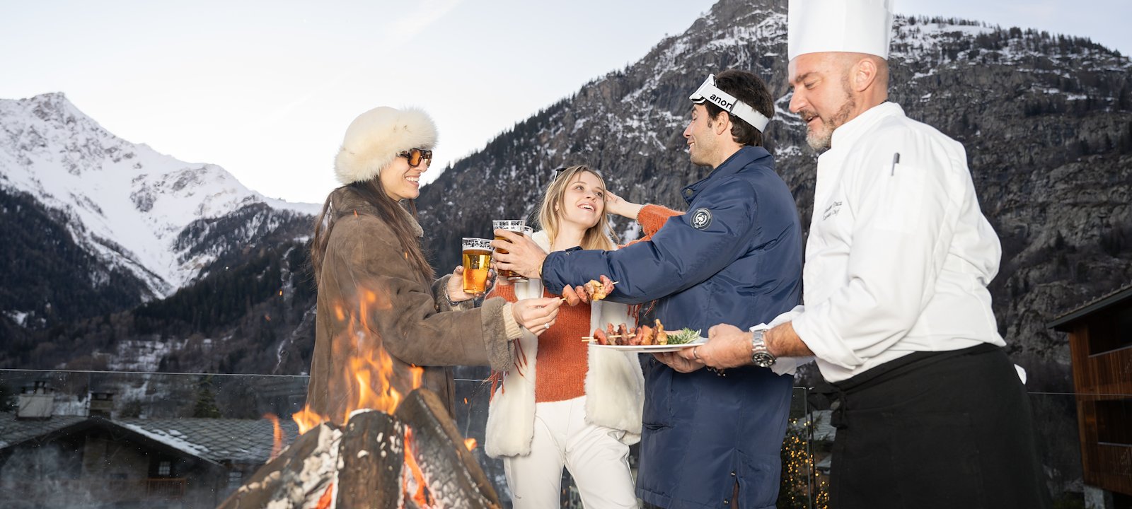 <p>Enjoying après-ski drinks by the fire.</p>
