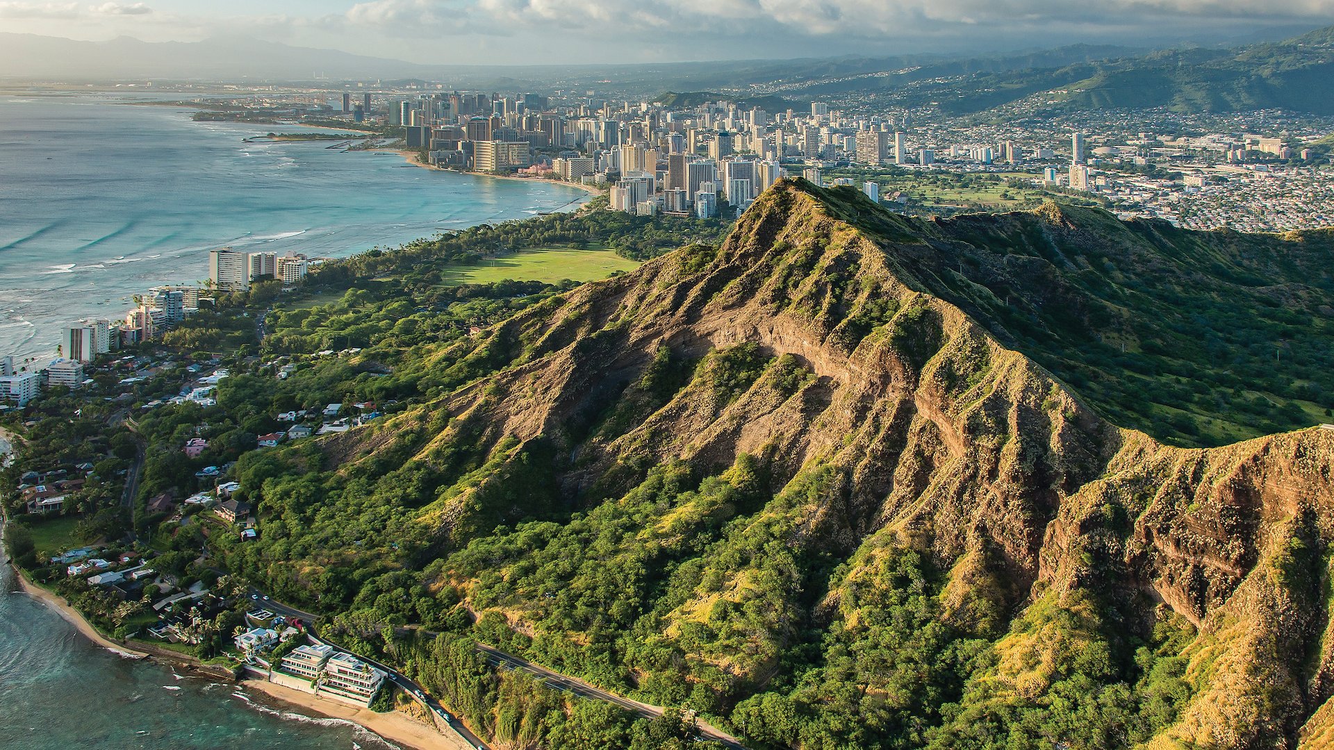 The enormous crater of Diamond Head lies close to Waikīkī.