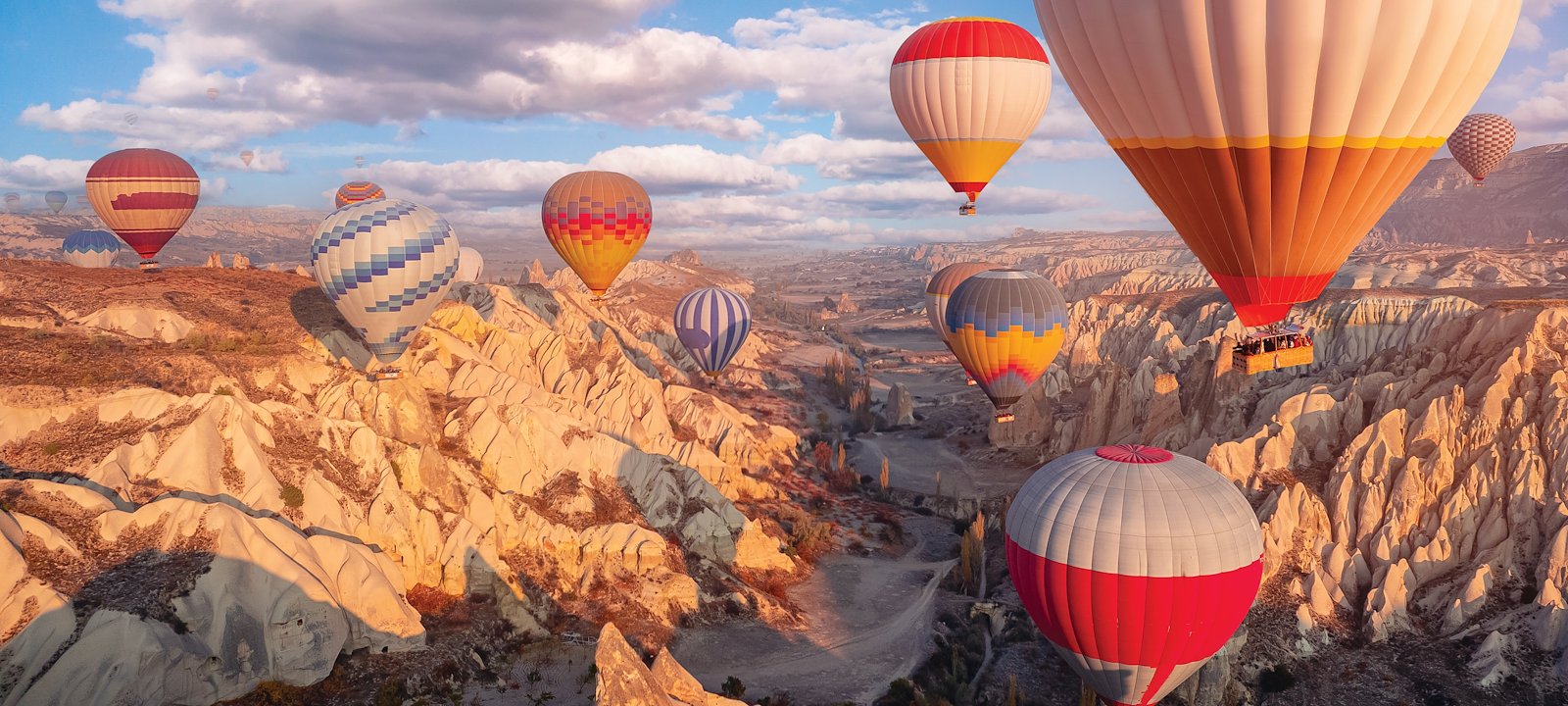 Hot-air balloon rides offer breathtaking views over Cappadocia, Turkey. 