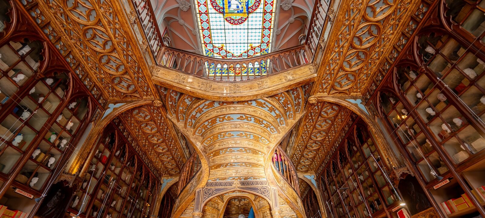 The iconic winding staircase of Livraria Lello in Porto, Portugal.