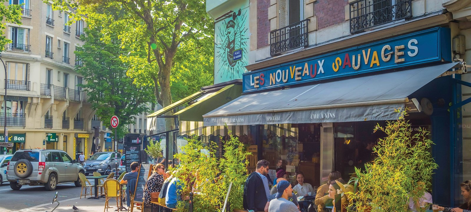 Sidewalk dining in Belleville, Paris.