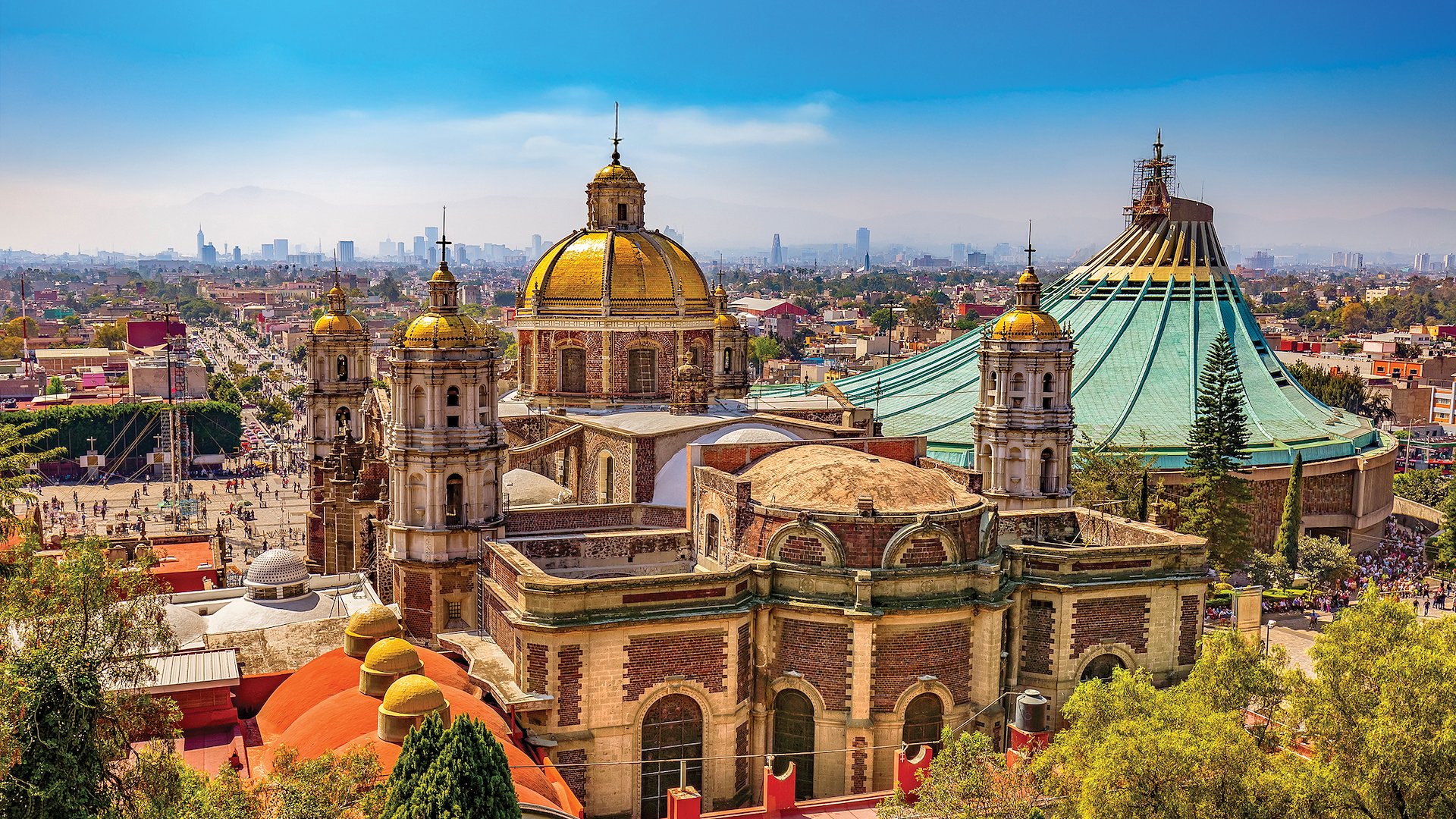 Basílica de Santa María de Guadalupe and Mexico City skyline views.