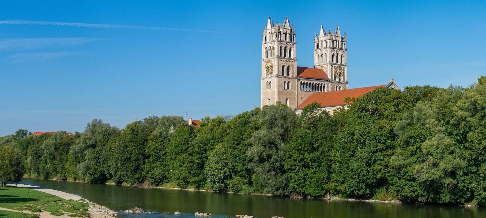 The church of St. Maximilian overlooks the Isar river in the Glockenbachviertel district.