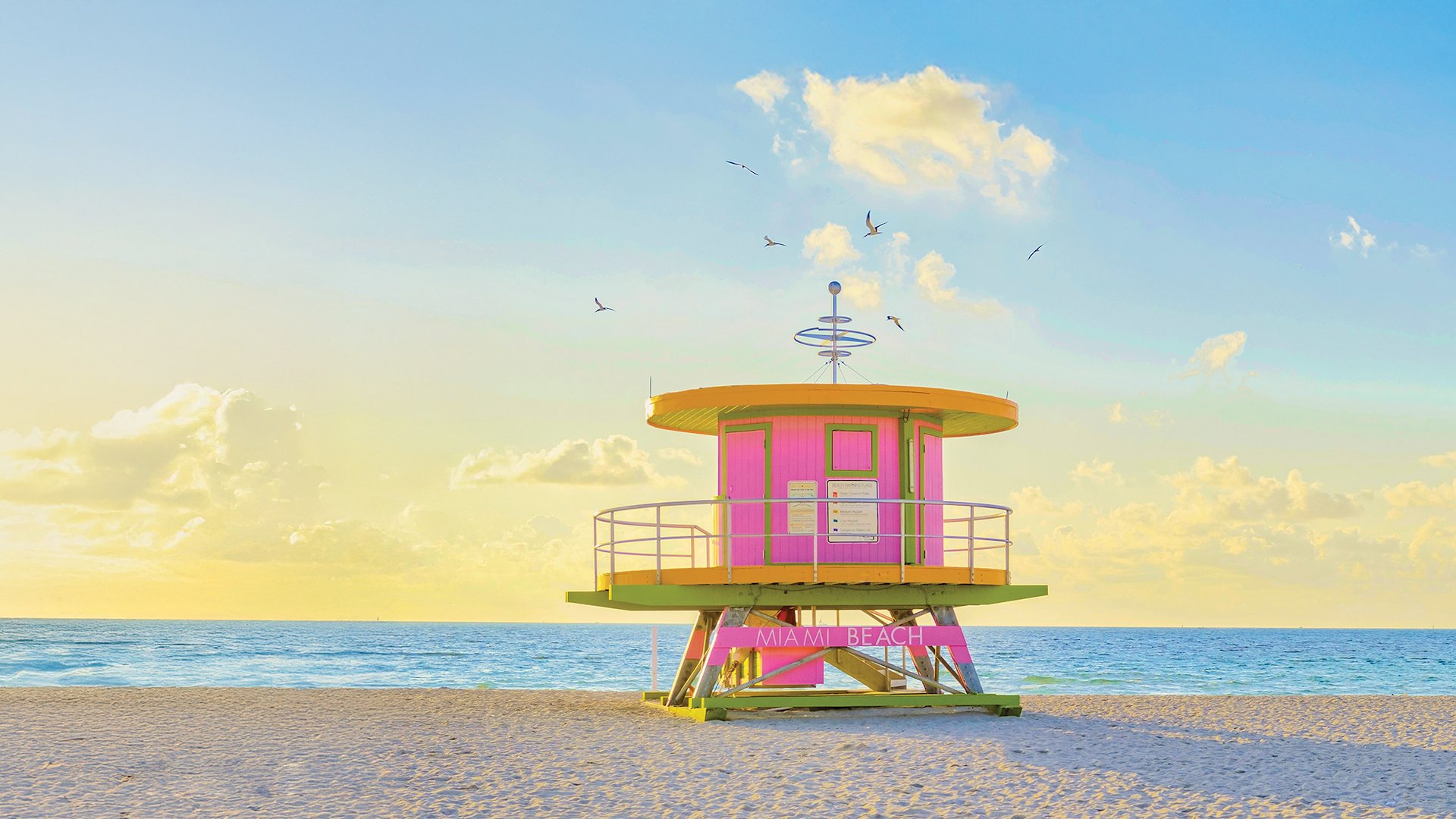 Miami Beach is dotted with iconic, colorful lifeguard huts.