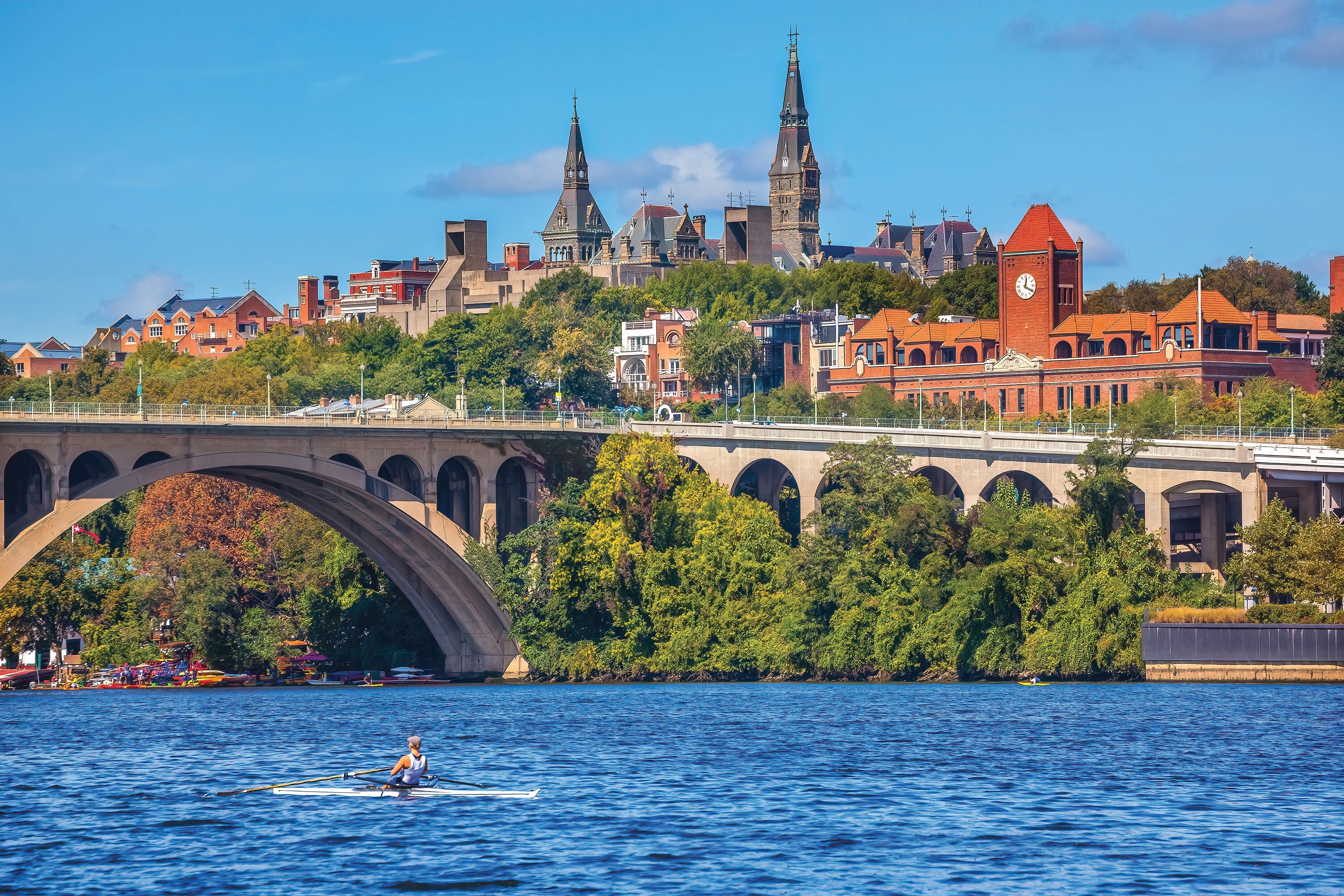 <p>The spires of Georgetown University can be seen beyond Francis Scott Key Memorial Bridge.</p>