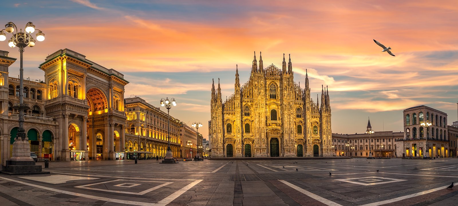 Duomo square and Milan Cathedral at sunrise.