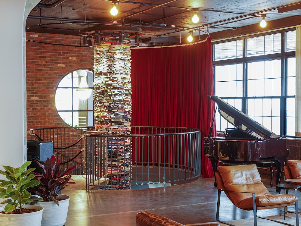 Piano and Book Tower Lobby Sela V Hotel, Brooklyn