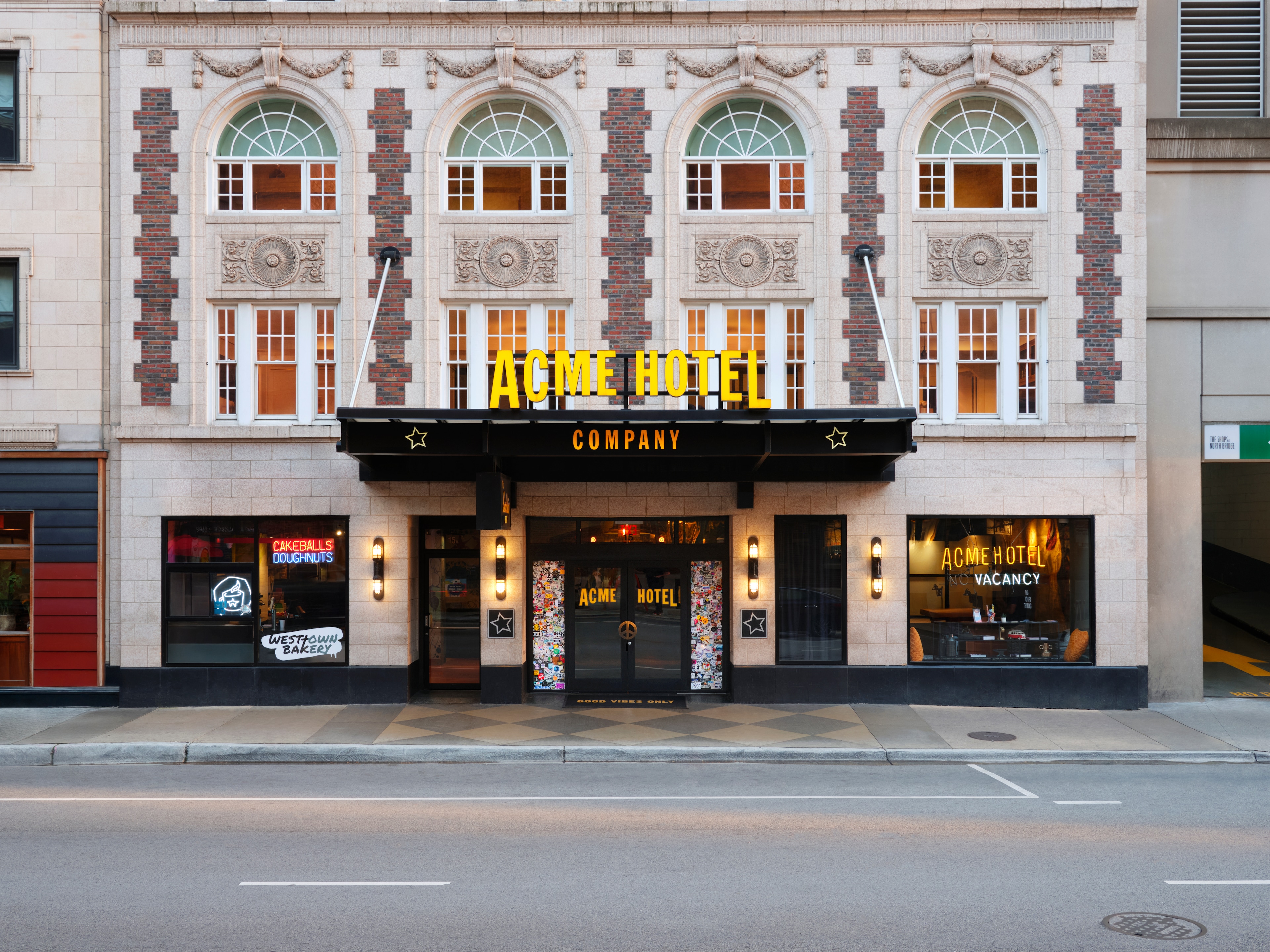 ACME Hotel in Chicago features a stylish entrance with vintage architecture.
