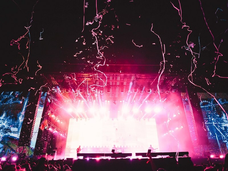 A stage with lights and fireworks