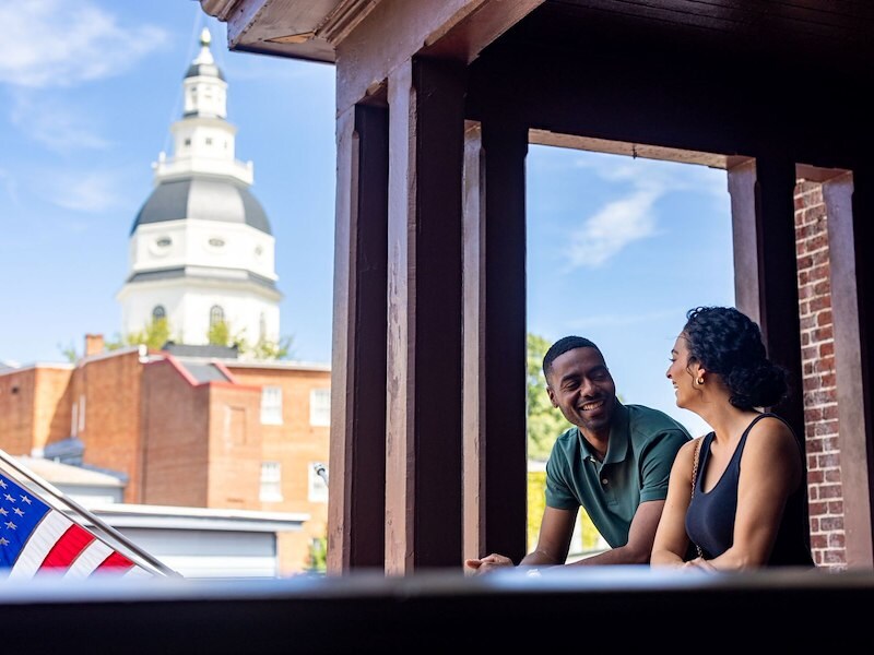 Couple enjoying their time on their guest room balcony
