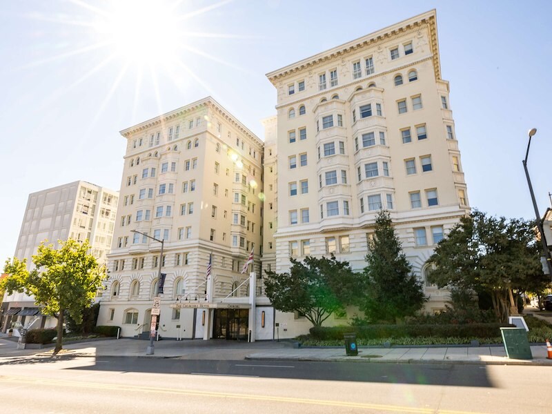 Churchill Hotel exterior on Embassy Row, Washington DC, historic architecture in bright daylight