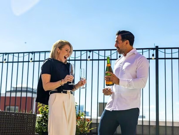 Couple Enjoying Champagne Amenity