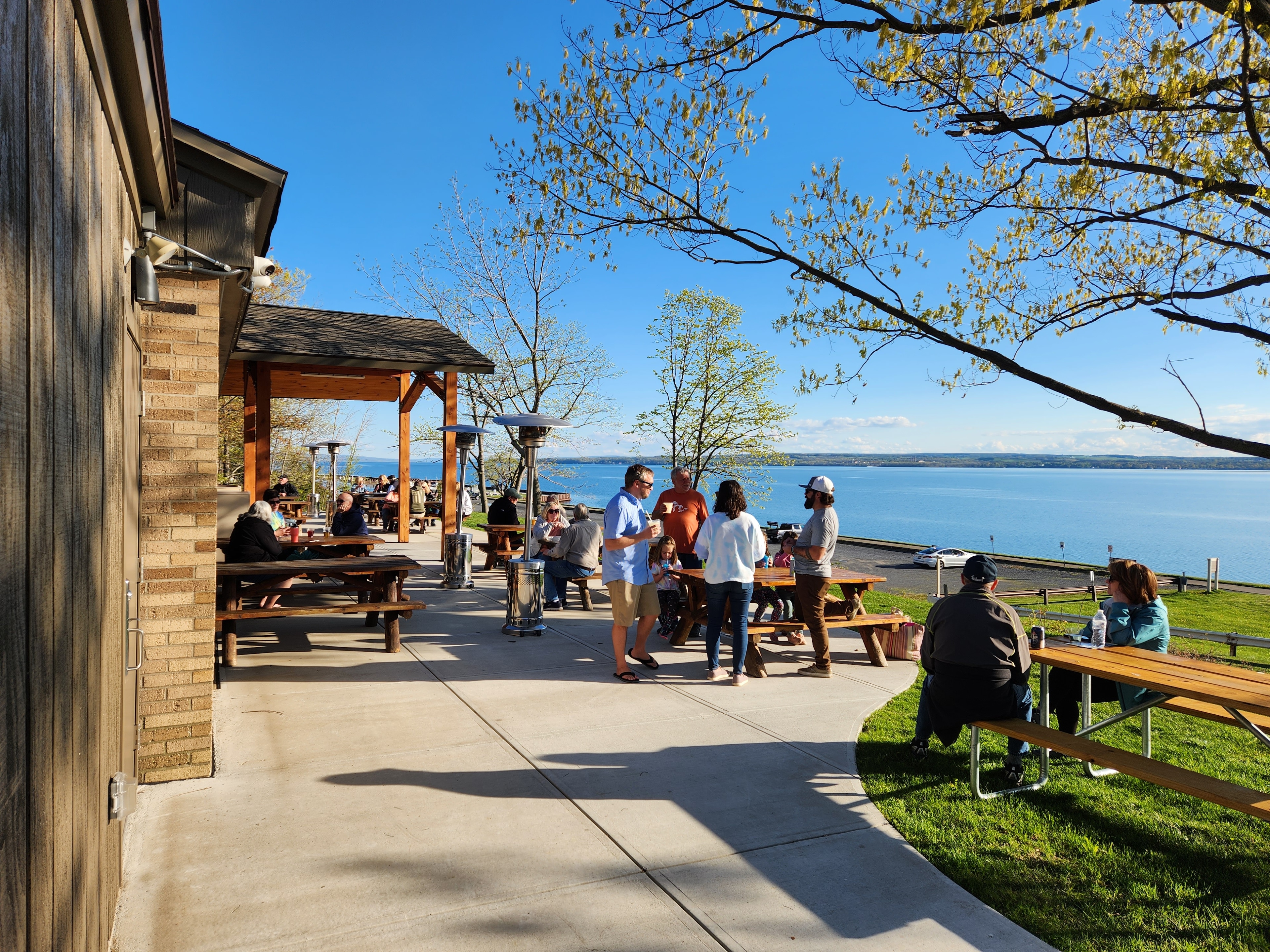 Guests enjoy the scenic outdoor area at Seneca Lake Resorts in Romulus, NY.