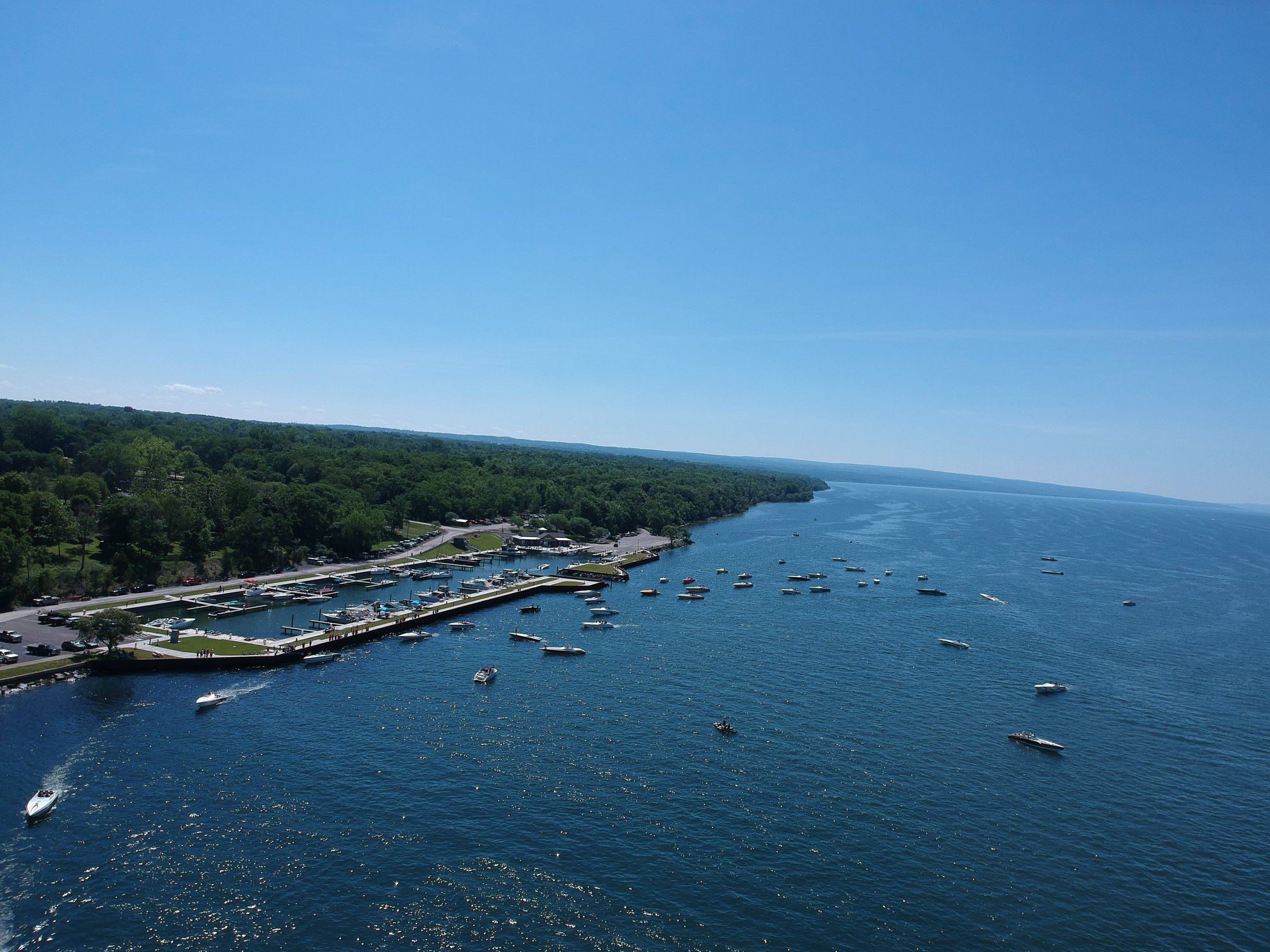 A scenic view of boats on Seneca Lake near Seneca Lake Resorts.