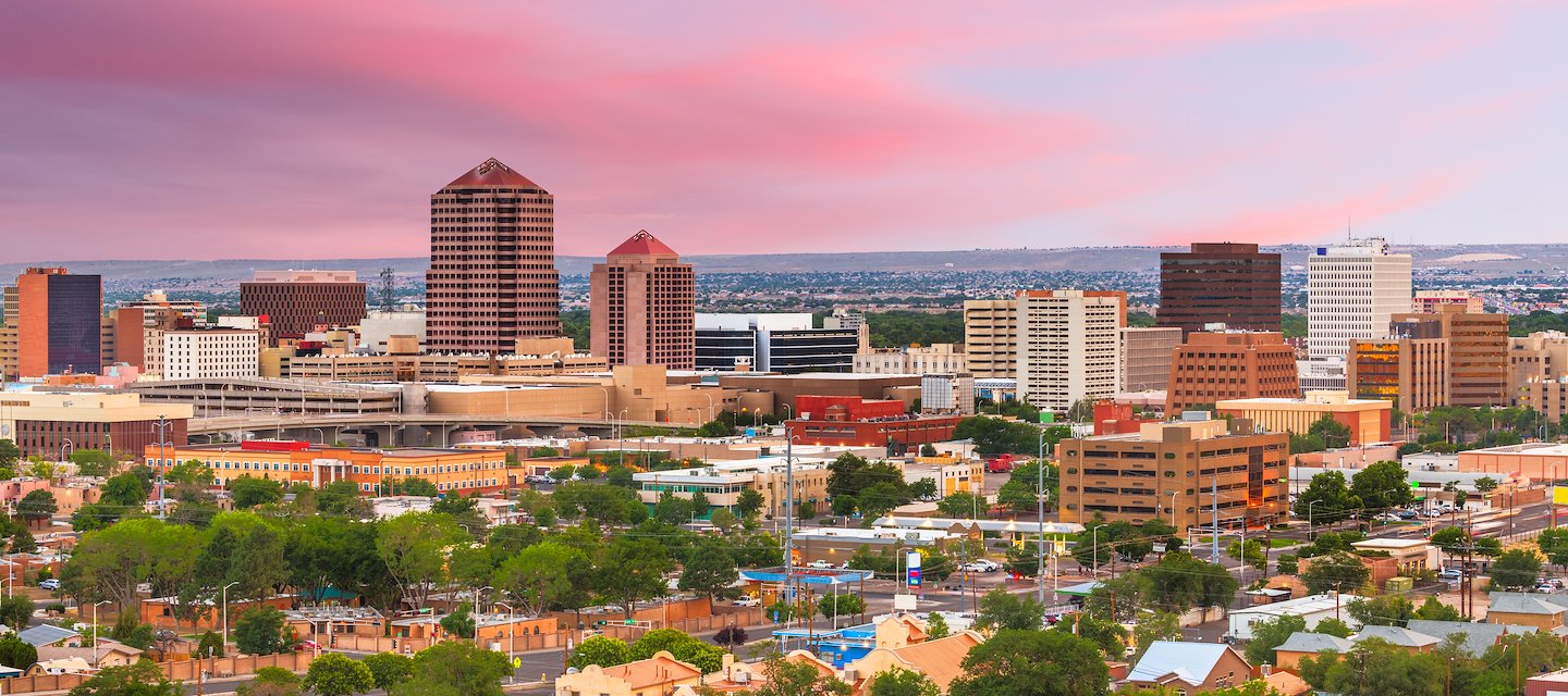 The city of albuquerque, new mexico, is seen in the background