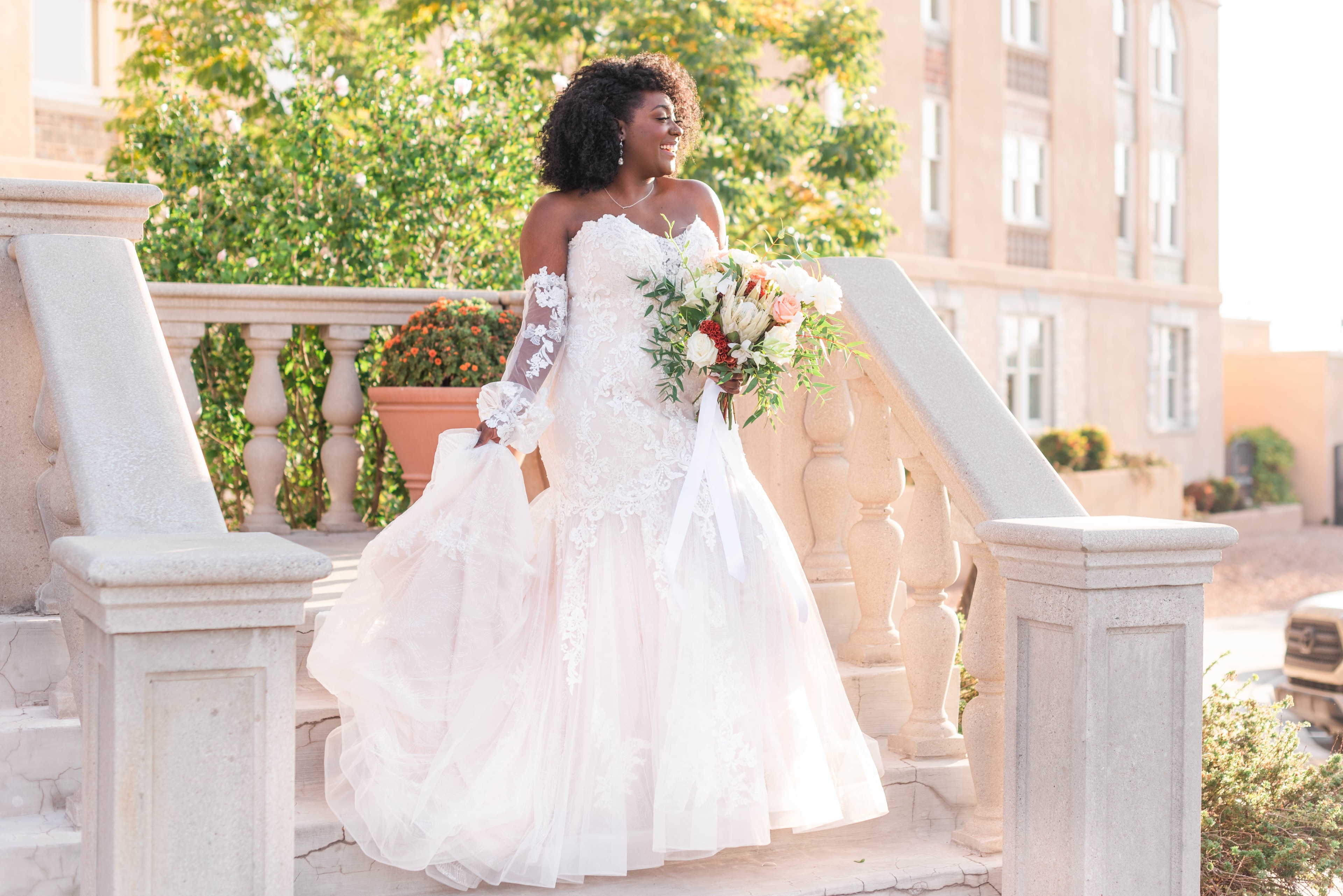 A bride standing on the steps of a hotel, Hotel Parq Central, Albuquerque, New Mexico