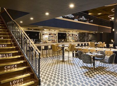 How are Stonebridge and Real Hospitality Group connected?