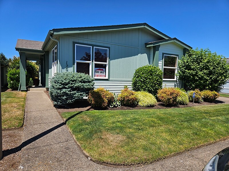 Lakeridge of Eugene - A house with a sign in the front