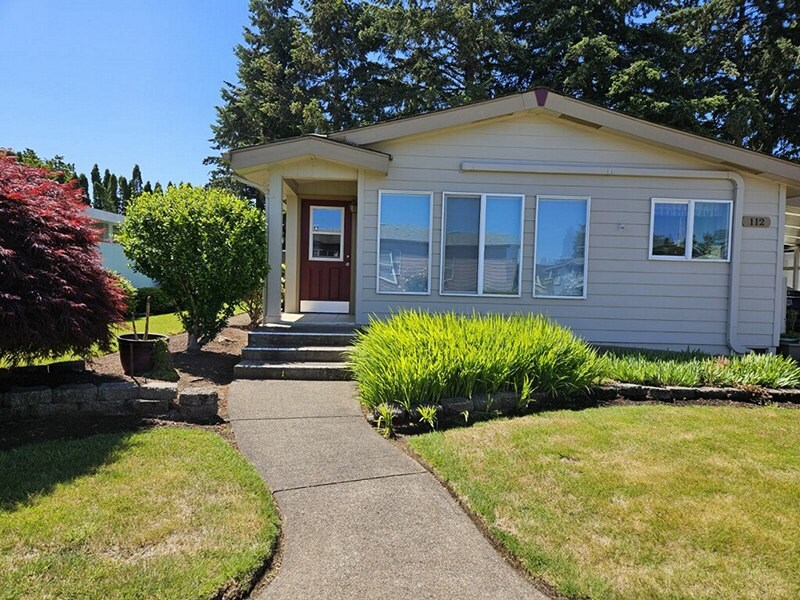 Lakeridge of Eugene - A house with a sign in the front