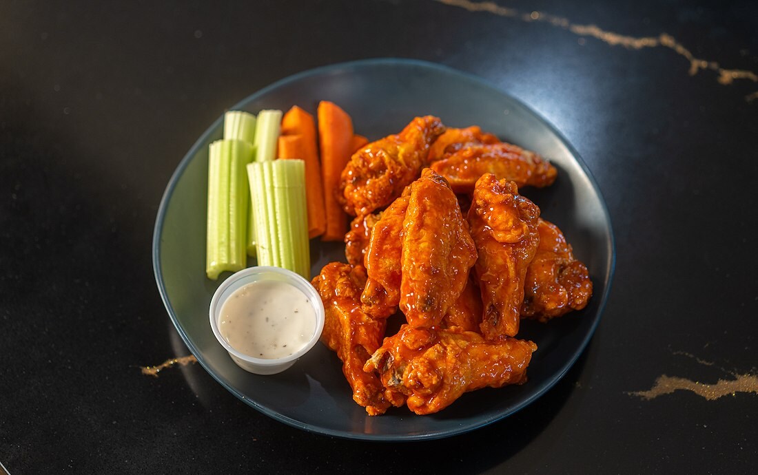 Chicken wings with dipping sauce