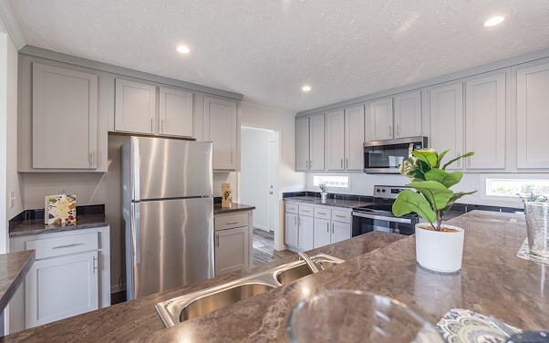 Clean, modern kitchen with stainless steel appliances