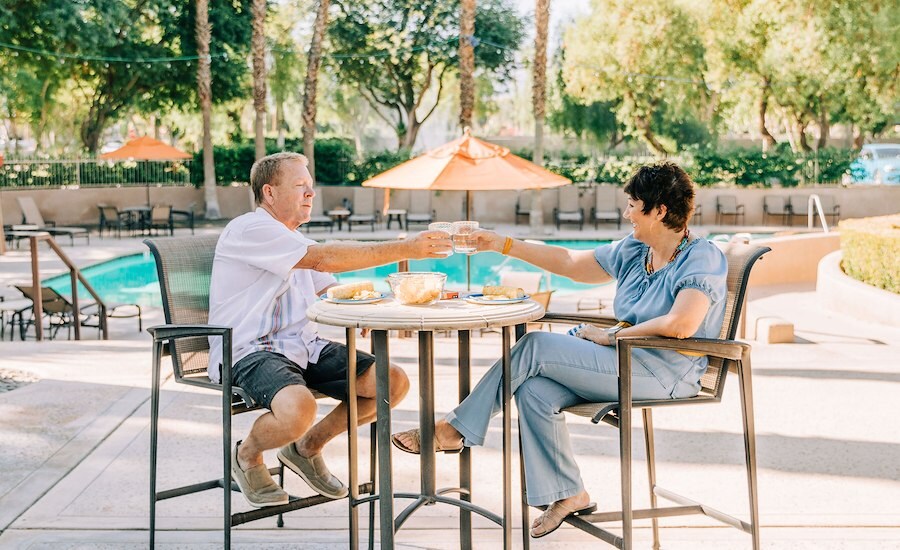 Dinner Service Near Swimming Pool at Emerald Desert RV Resort, California