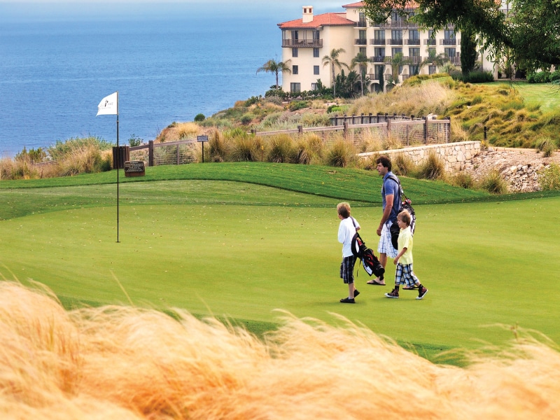 father son oceanfront golf