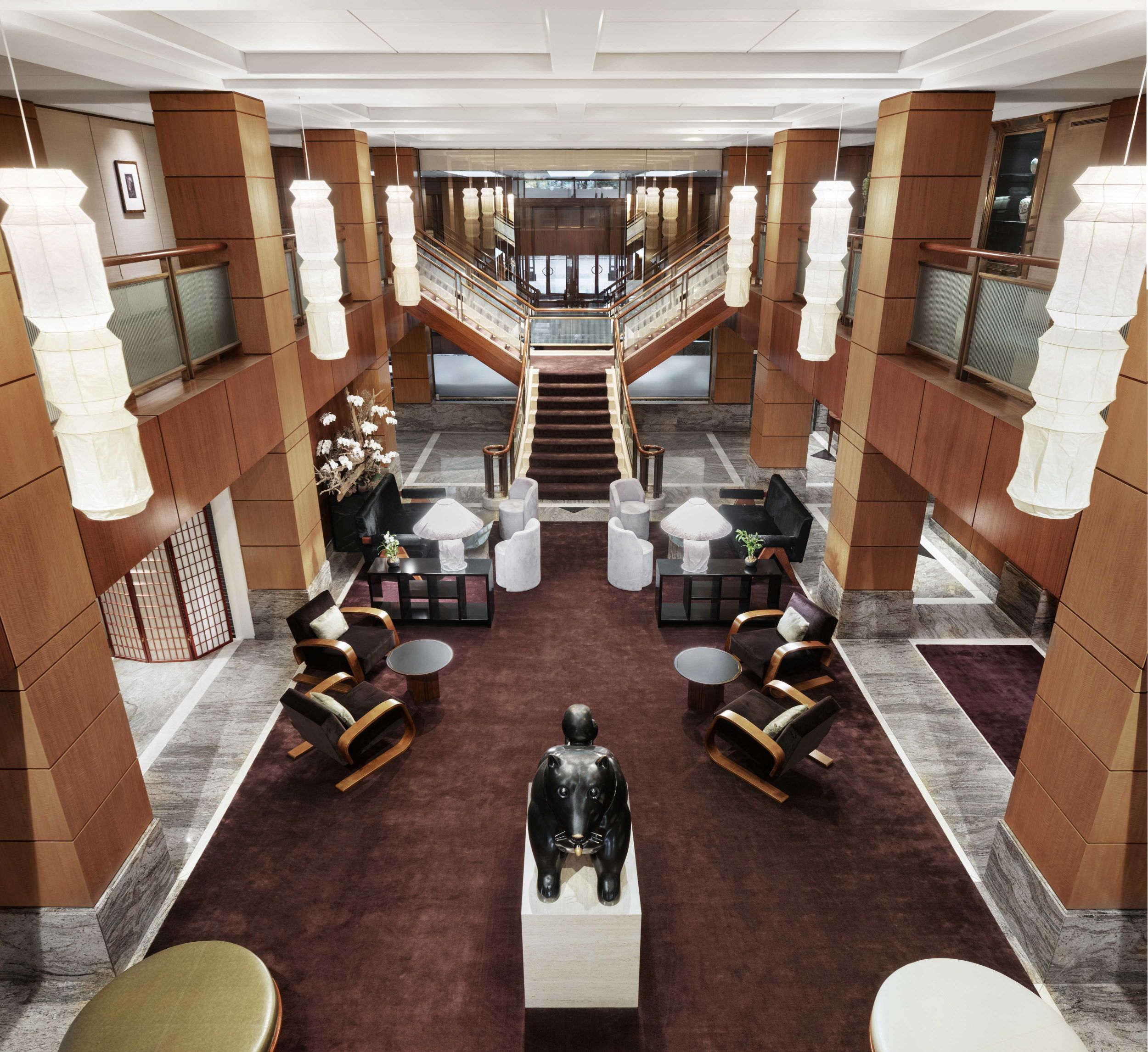 Entire Lobby View with dog statue of The Kitano Hotel New York