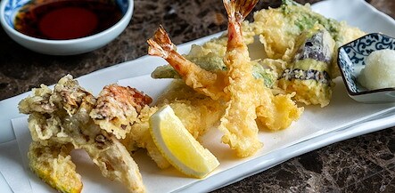 A plate with fried shrimp and other food, The Kitano Hotel New York