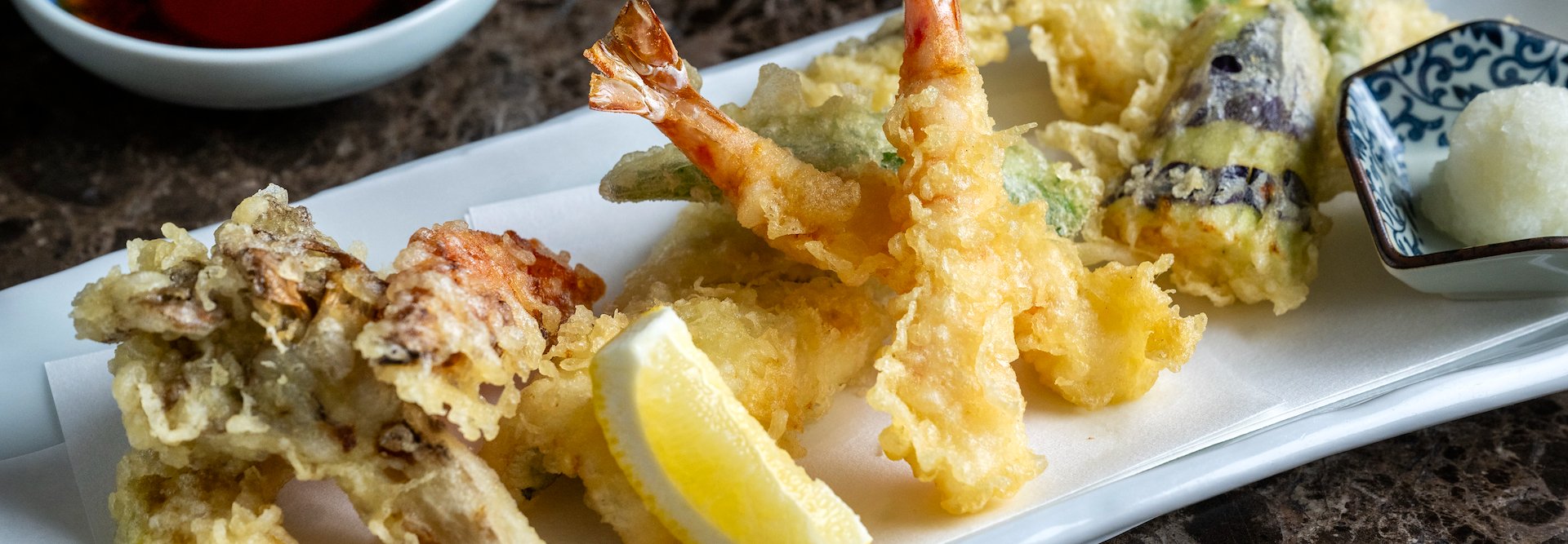 A plate with fried shrimp and other food, The Kitano Hotel New York