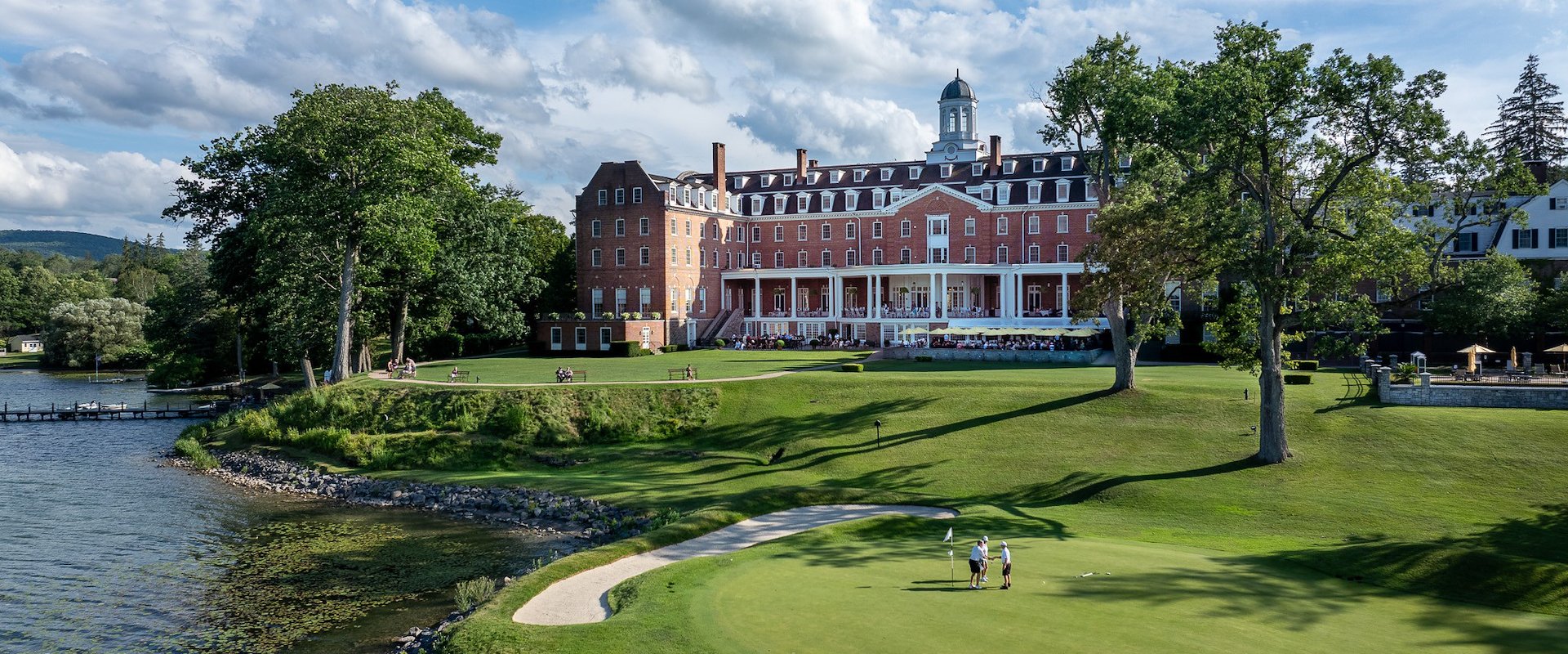 Golf course at The Otesaga Resort Hotel, New York, with green fairways and beautiful lake views