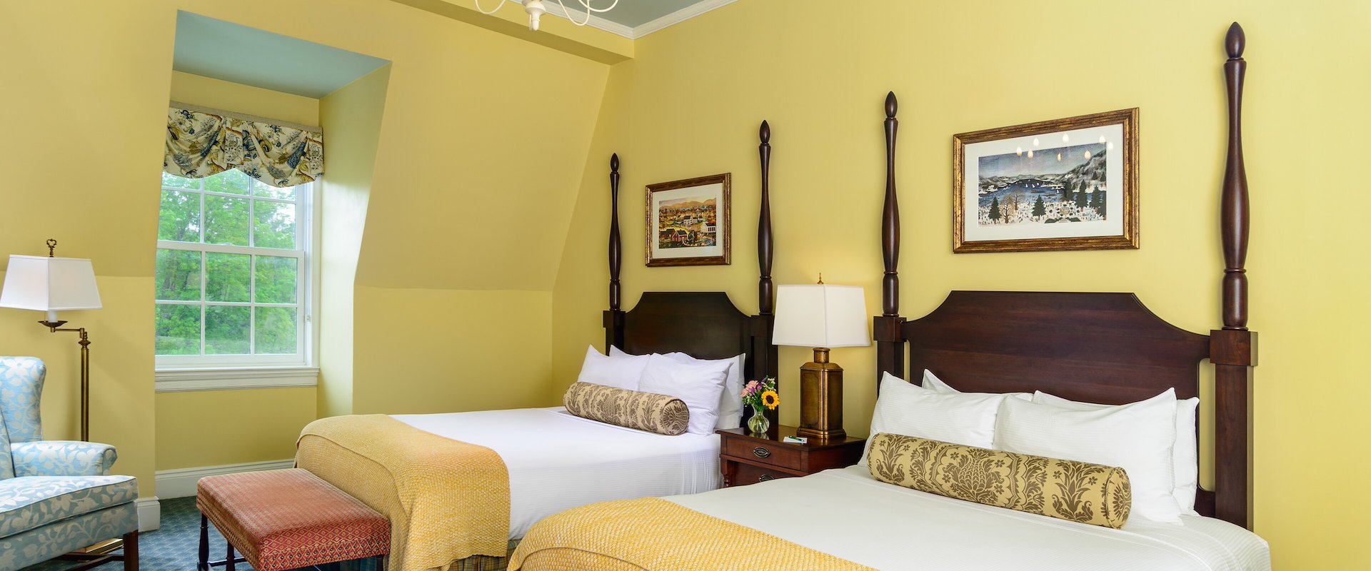 Deluxe Room at The Otesaga Resort Hotel, New York, featuring a spacious layout, elegant decor, and scenic lake views