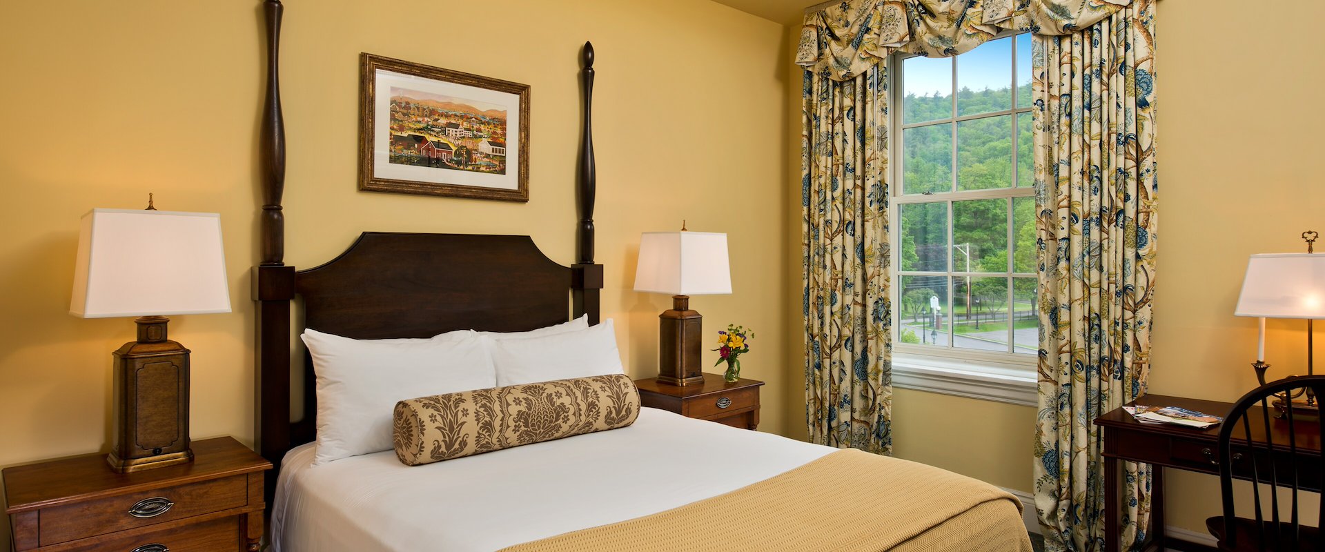 Traditional Room at The Otesaga Resort Hotel, New York, with classic furnishings, cozy layout, and charming village views