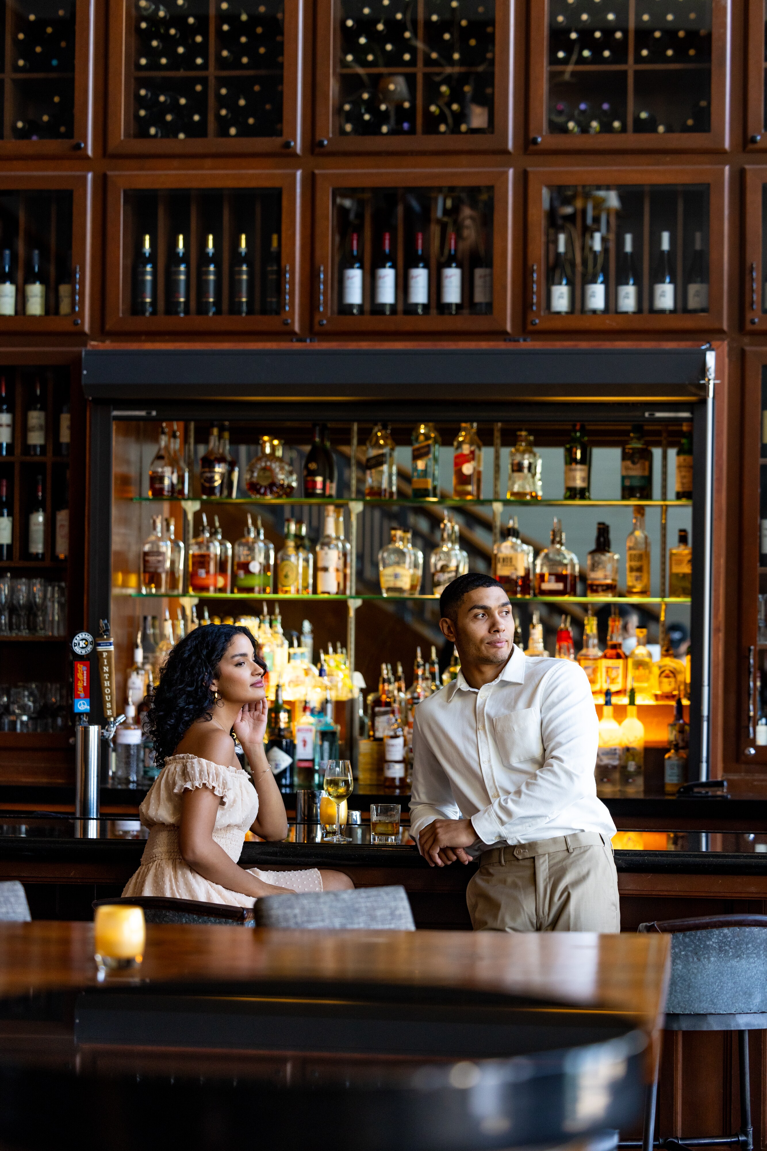 A couple sits in a stylish bar at Lakeway Resort & Spa, Texas