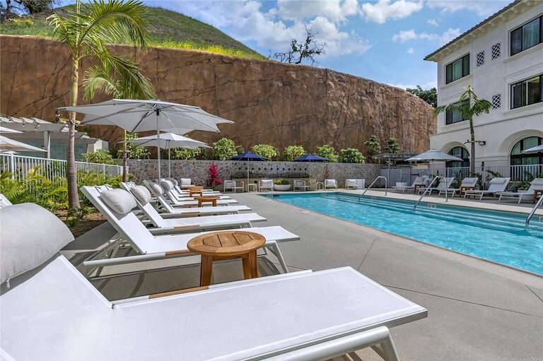 Outdoor Pool & Relaxing Poolside Amenities