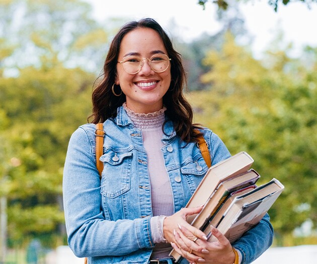 Smiling young college student on campus