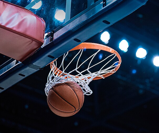 Close up of a basketball swish through the net