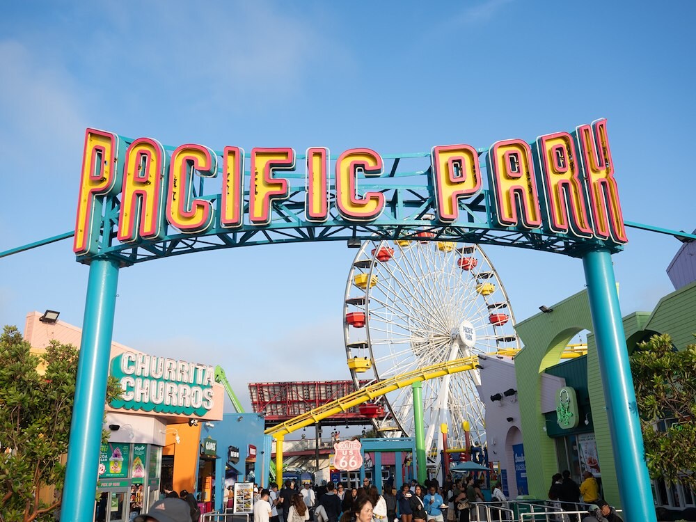 Sign at the entrance to Pacific Park, Santa Monica, California