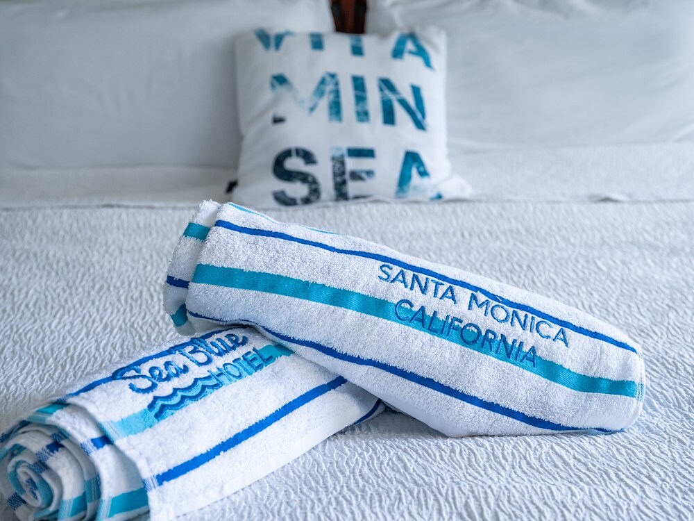 Sea Blue Hotel beach towels on bed