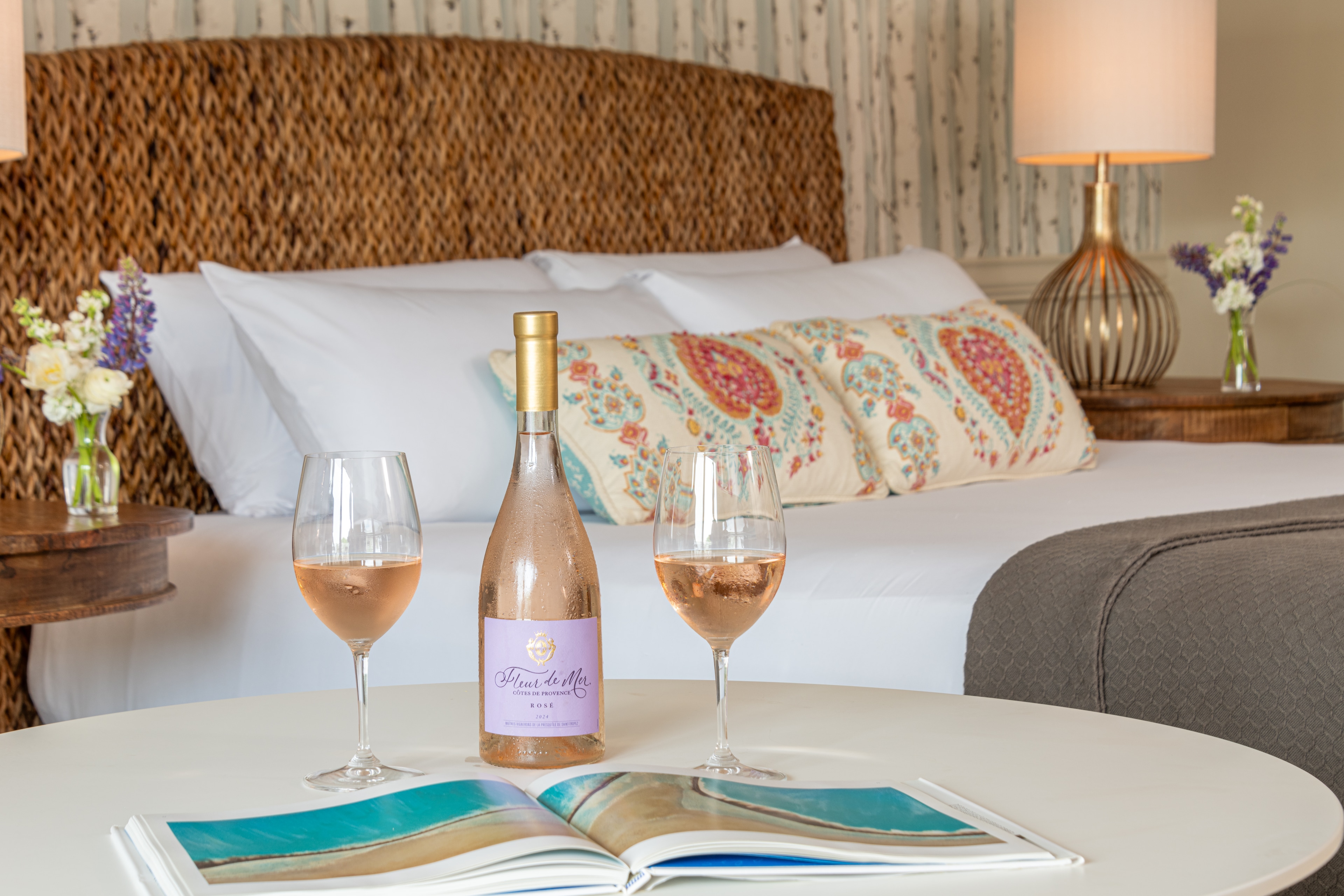 A cozy room at The Bayview Hotel, featuring wine and beautiful decor.