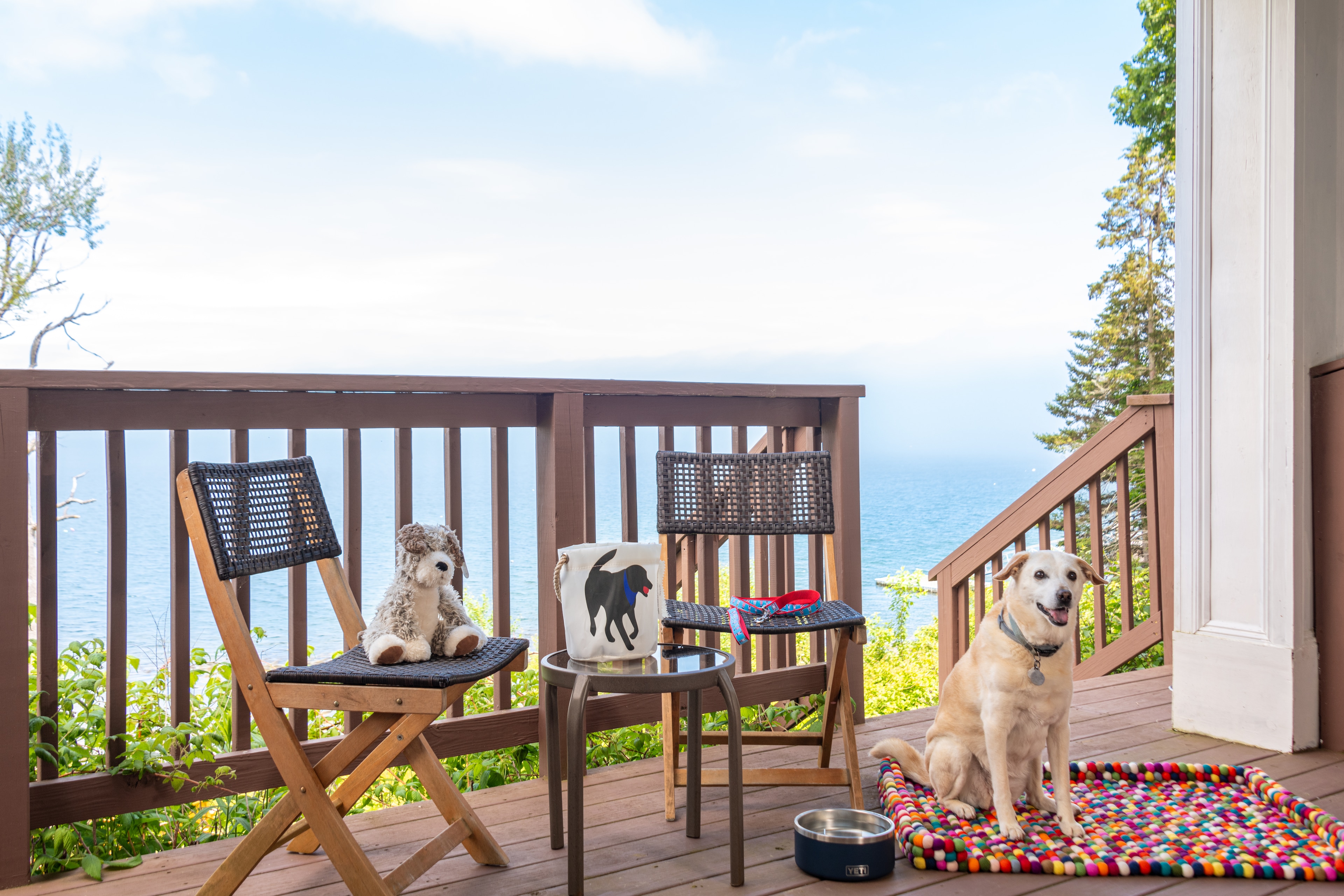 A welcoming pet-friendly porch at The Bayview Hotel in Bar Harbor, Maine.