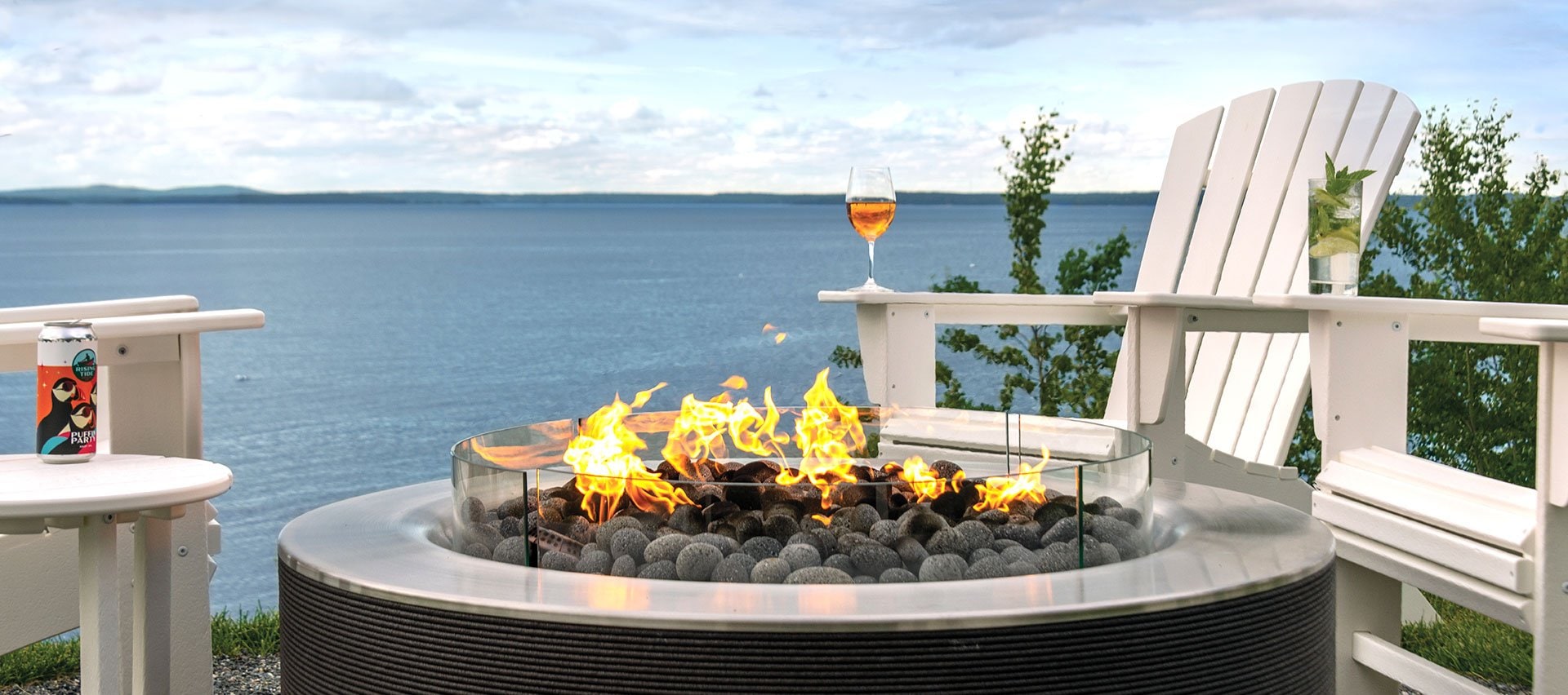 Relax by the water at the fire pit at The Bayview Hotel in Bar Harbor, Maine.