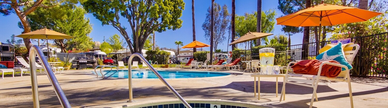 Exclusive Pool With Lounge Chairs at Vacationer RV Resort, California